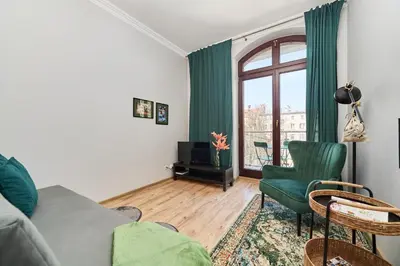 Część wypoczynkowa w obiekcie Apartament SZEPT Galeria Dominikańska by Noclegi Renters
