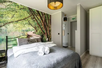 Łóżko lub łóżka w pokoju w obiekcie RentPlanet - Apartament Żytnia