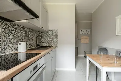 Kuchnia lub aneks kuchenny w obiekcie RentPlanet - Apartament Żytnia