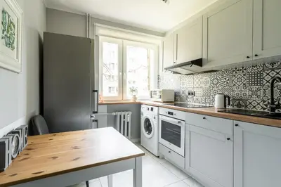 Kuchnia lub aneks kuchenny w obiekcie RentPlanet - Apartament Żytnia