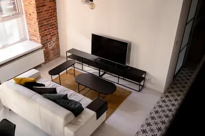 Telewizja i/lub zestaw kina domowego w obiekcie RentPlanet - Nowa Papiernia
