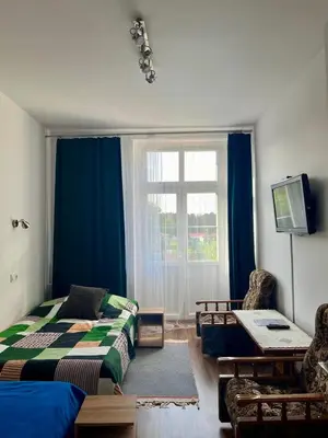 Łóżko lub łóżka w pokoju w obiekcie Apartament Koszary