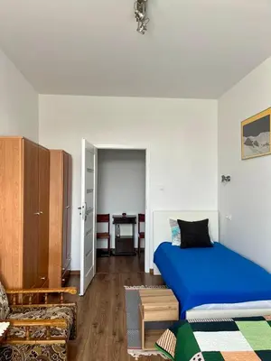 Łóżko lub łóżka w pokoju w obiekcie Apartament Koszary