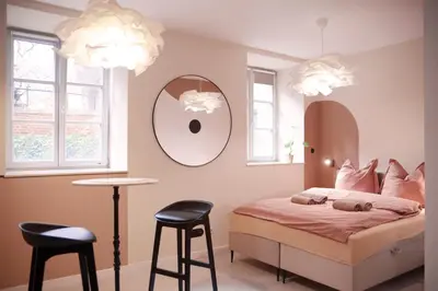 Łóżko lub łóżka w pokoju w obiekcie Energetic Apartment in City Center!