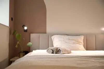 Łóżko lub łóżka w pokoju w obiekcie Energetic Apartment in City Center!