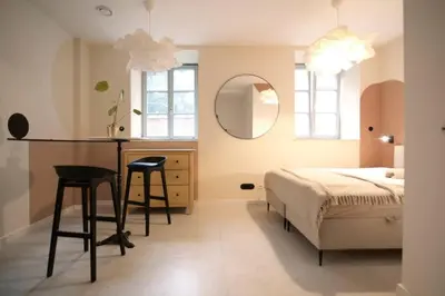 Łóżko lub łóżka w pokoju w obiekcie Energetic Apartment in City Center!