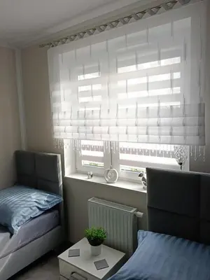 Łóżko lub łóżka w pokoju w obiekcie Apartament Zielony Zakątek Wrocław free parking, ochrona