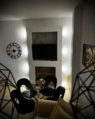 Telewizja i/lub zestaw kina domowego w obiekcie Apartament Nowar