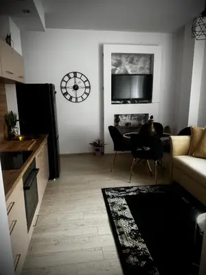 Telewizja i/lub zestaw kina domowego w obiekcie Apartament Nowar