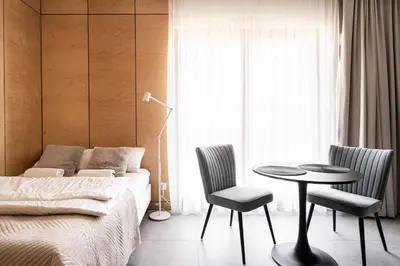 Łóżko lub łóżka w pokoju w obiekcie RentPlanet - Apartamenty przy Wyspie Słodowej