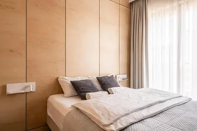 Łóżko lub łóżka w pokoju w obiekcie RentPlanet - Apartamenty przy Wyspie Słodowej