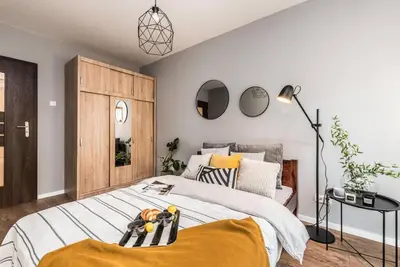Łóżko lub łóżka w pokoju w obiekcie Luksusowy apartament & Parking