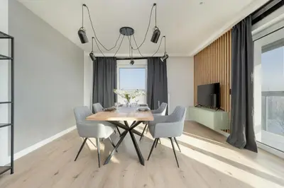 Część wypoczynkowa w obiekcie Exclusive River View Apartment with Balcony & FREE GARAGE by Renters Prestige