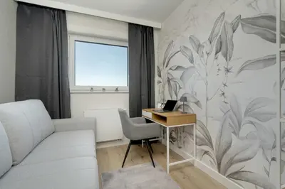 Część wypoczynkowa w obiekcie Exclusive River View Apartment with Balcony & FREE GARAGE by Renters Prestige
