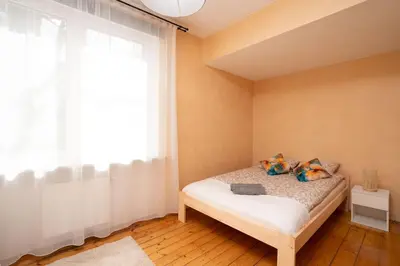Łóżko lub łóżka w pokoju w obiekcie Noclegi Zacisze - Pokoje Gościnne
