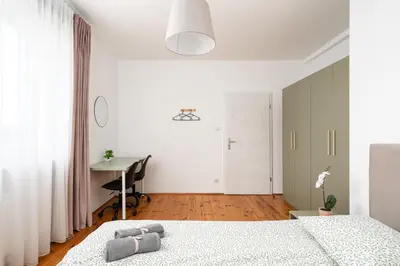 Łóżko lub łóżka w pokoju w obiekcie Noclegi Zacisze - Pokoje Gościnne