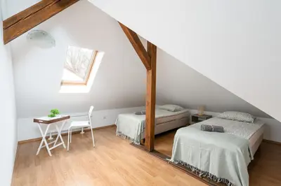 Łóżko lub łóżka w pokoju w obiekcie Noclegi Zacisze - Pokoje Gościnne