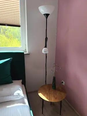 Łóżko lub łóżka w pokoju w obiekcie Apartament Przebiśnieg