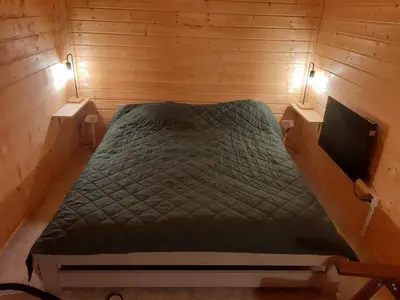 Łóżko lub łóżka w pokoju w obiekcie Srebrny Domek