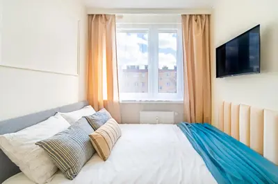 Łóżko lub łóżka w pokoju w obiekcie Apartament Przytulny, Klimatyzacja, PW INVEST HOME