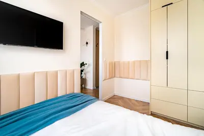 Łóżko lub łóżka w pokoju w obiekcie Apartament Przytulny, Klimatyzacja, PW INVEST HOME