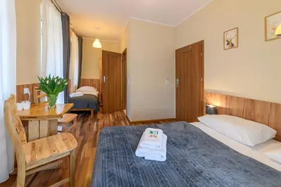 Łóżko lub łóżka w pokoju w obiekcie Villa Fortuna