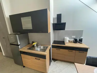 Kuchnia lub aneks kuchenny w obiekcie Apartamenty Świerkowa #2