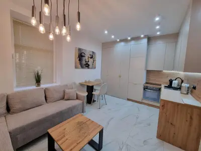 Kuchnia lub aneks kuchenny w obiekcie APARTAMENT JEDLINKA B
