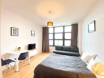 Łóżko lub łóżka w pokoju w obiekcie Apartimento Hydral Vento