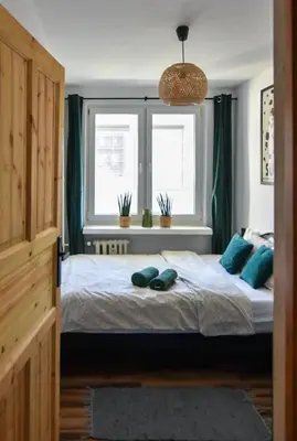 Łóżko lub łóżka w pokoju w obiekcie Salamandra - SUDETY