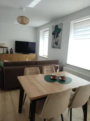 Telewizja i/lub zestaw kina domowego w obiekcie Apartament Leon
