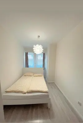 Łóżko lub łóżka w pokoju w obiekcie Apartament w rynku