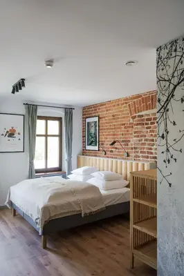 Łóżko lub łóżka w pokoju w obiekcie Willa Bywaj Zdrój