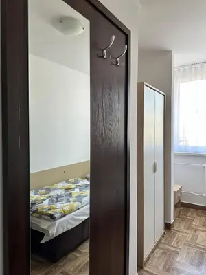 Łóżko lub łóżka w pokoju w obiekcie Zajazd Polonia