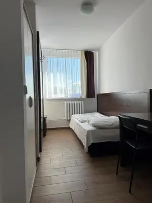 Łóżko lub łóżka w pokoju w obiekcie Zajazd Polonia