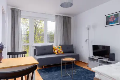 Część wypoczynkowa w obiekcie Rynek Wrocław Cosy Studio by BookingHost