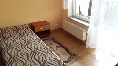 Łóżko lub łóżka w pokoju w obiekcie Pokoje w Uzdrowisku