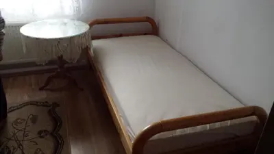 Łóżko lub łóżka w pokoju w obiekcie Pokoje w Uzdrowisku