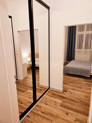 Łóżko lub łóżka w pokoju w obiekcie Justinrent 3