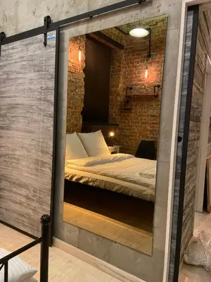 Łóżko lub łóżka w pokoju w obiekcie Apartament w sercu miasta by Apartamenty na dni Wrocław