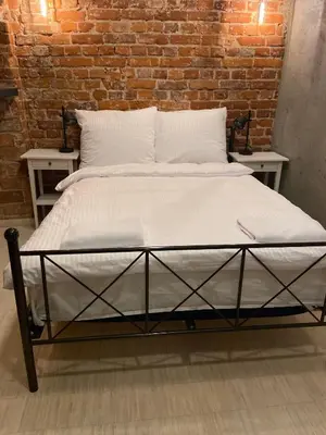 Łóżko lub łóżka w pokoju w obiekcie Apartament w sercu miasta by Apartamenty na dni Wrocław