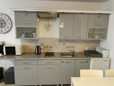 Kuchnia lub aneks kuchenny w obiekcie Apartament na Cichej