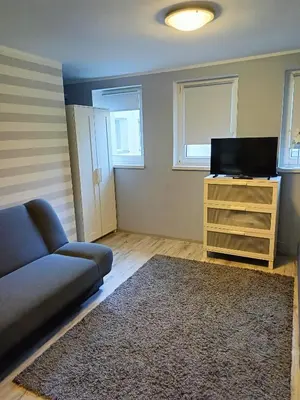 Telewizja i/lub zestaw kina domowego w obiekcie Apartament na Cichej