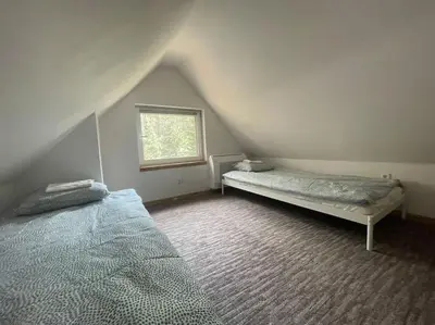 Łóżko lub łóżka w pokoju w obiekcie Sunny Home Turawa