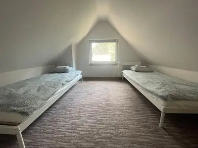 Łóżko lub łóżka w pokoju w obiekcie Sunny Home Turawa