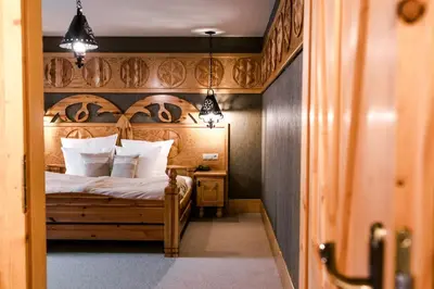 Łóżko lub łóżka w pokoju w obiekcie Bajka Hotel & Resort