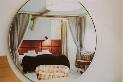 Łóżko lub łóżka w pokoju w obiekcie Bajka Hotel & Resort