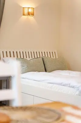 Łóżko lub łóżka w pokoju w obiekcie Słone 103