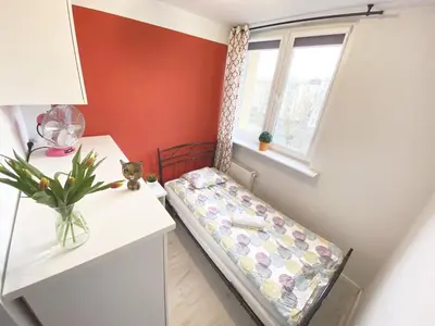 Łóżko lub łóżka w pokoju w obiekcie 3rooms-Balcony-PKP - DeerRest Apart
