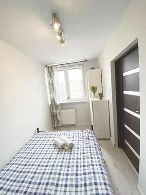 Łóżko lub łóżka w pokoju w obiekcie 3rooms-Balcony-PKP - DeerRest Apart